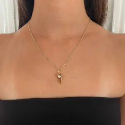 Shop GOLD AND ROUND DIAMOND BABY WHISTLE Pendants